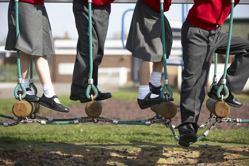 Inconsistent monitoring of asbestos in Welsh schools could put pupils and staff at risk, unions have warned